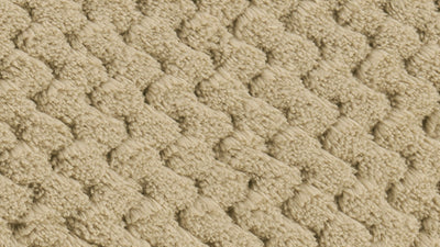 Textured beige carpet with Oeko-Tex Standard 100 logo in the corner