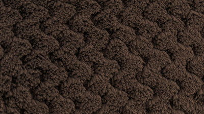 Brown textured fabric with OEKO-TEX Standard 100 logo in the corner